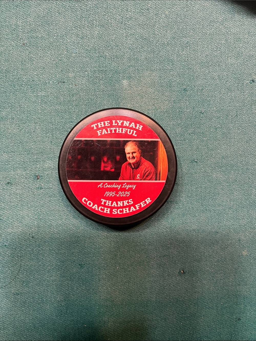 Hockey Puck - The Lynah Faithful Thanks Coach Schafer 1995-2025A Coaching legacy